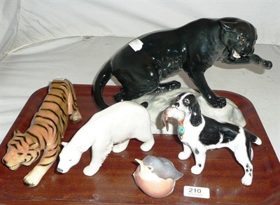 Lot 210 - A Beswick panther on a rocky base, pottery tiger, bone china spaniel with dead game, a polar...