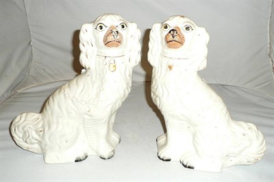 Lot 214 - A pair of Staffordshire spaniels