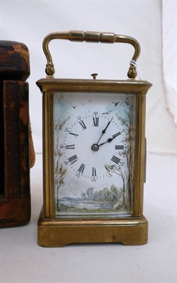 Lot 223 - An alarm carriage clock in case