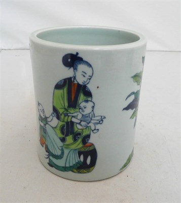 Lot 227 - A Chinese Doucai porcelain brush pot, cylindrical, decorated with a mother and two children and...