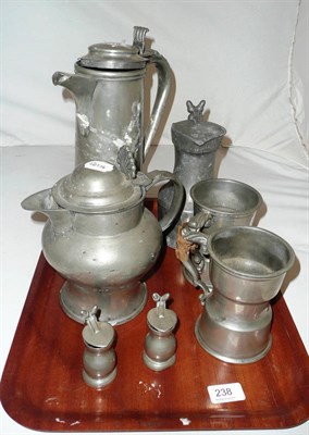 Lot 238 - Three pewter tankards with double acorn knops, two pewter jugs and two mugs