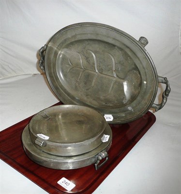 Lot 240 - Three pewter warming dishes