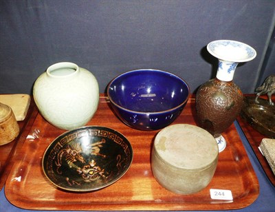 Lot 244 - A Chinese blue bowl, a brown bowl, green vase, and a jar and cover