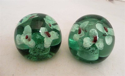 Lot 259 - Pair of J. Kilner Ltd marked coloured glass paperweights