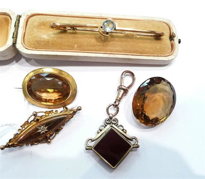 Lot 271 - A 9ct gold chain, and another chain, a citrine brooch, a loose citrine, a Victorian diamond set...