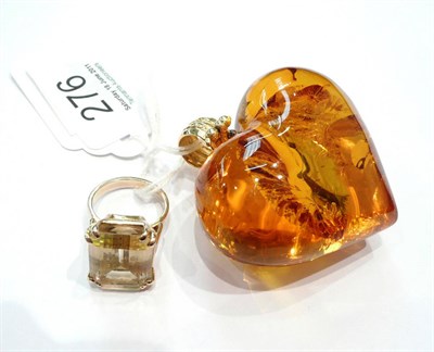 Lot 276 - A quartz ring and a heart pendant