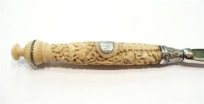 Lot 288 - A carved bone handled paper knife