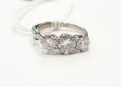 Lot 293 - An 18ct and platinum three stone diamond ring