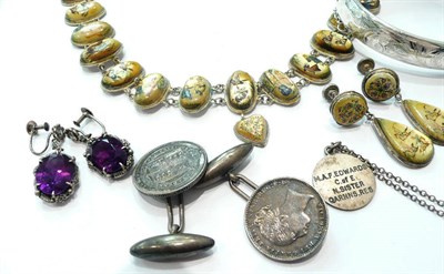 Lot 302 - A silver bangle, an Eastern necklace and earring set, a pair of coin cufflinks, a pendant on...