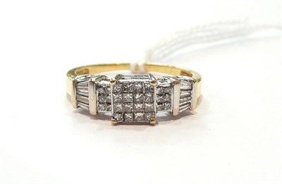 Lot 311 - An 18ct gold diamond multi cluster ring