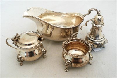 Lot 320 - Silver sauce boat and matching three piece silver cruet, 18.5 oz