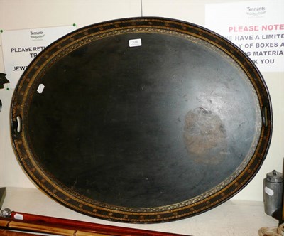 Lot 326 - A large oval papier mache tray with gilt decoration