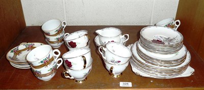 Lot 328 - Royal Stafford tea set 'Roses to Remember' and a 19th century transfer-printed tea service