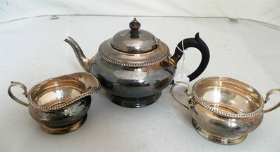 Lot 334 - Silver three piece tea service, 33.5 oz