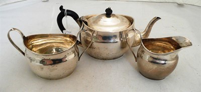 Lot 335 - Silver three piece tea service, makers mark N&H, 20 oz