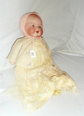 Lot 337 - Armand Marseille baby doll with flange neck on a composition and fabric body, clothed