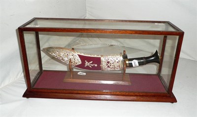 Lot 339 - A presentation kukri in a glazed display case