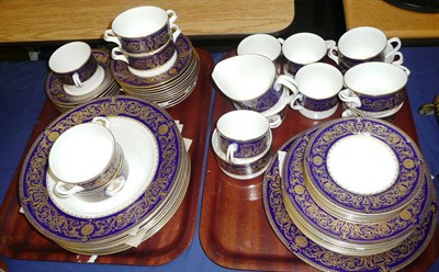 Lot 345 - Royal Worcester Sandringham pattern blue and gilt dinner service on two trays