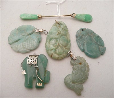 Lot 360 - A jade type pin (a.f.), five jade type pendants including; an elephant (cracked), a double...