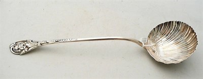 Lot 371 - A Georgian silver soup ladle with later decoration, 6.5 oz