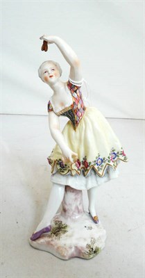 Lot 384 - A 19th century model of a female Harlequin