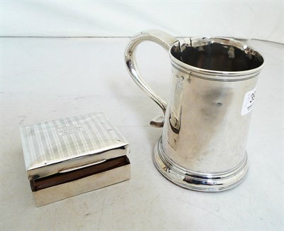 Lot 393 - A Georgian silver mug (a.f.) and a silver cigarette box (a.f.)