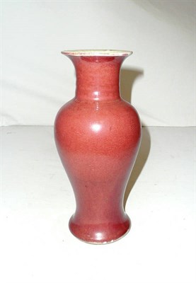 Lot 394 - A Chinese baluster Sang de Boeuf vase and receipt