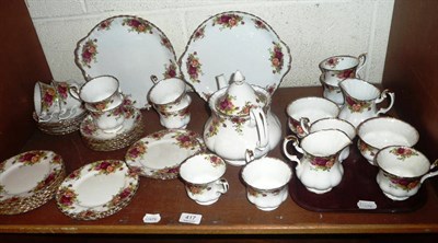 Lot 417 - A Royal Albert Country Rose pattern tea set