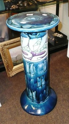 Lot 418 - A Mintons Secessionist No.14 pedestal, tube-lined and glazed in purple, green and blue, printed and