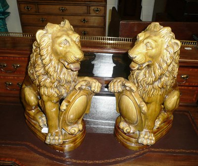 Lot 436 - Pair of glazed stoneware lions