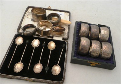 Lot 456 - Set of six silver napkin rings, set of six silver coffee spoons, four silver napkin rings and...