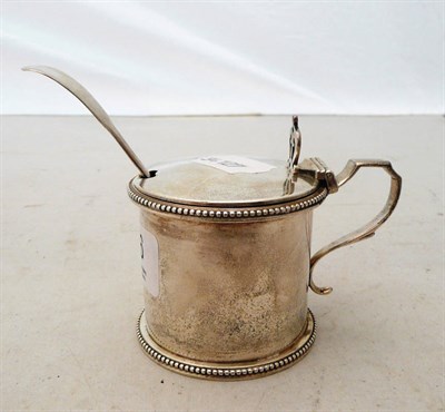 Lot 466 - Victorian silver mustard pot with blue glass liner and spoon, London 1878