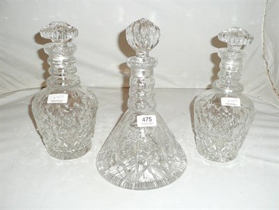 Lot 475 - Pair of cut glass ring neck decanters and a cut glass ships decanter