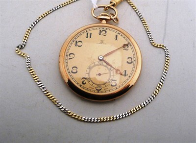 Lot 512 - An Omega 14k gold pocket watch and chain