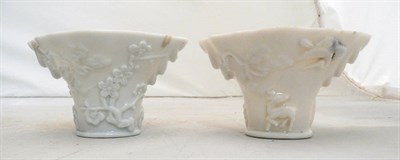 Lot 518 - Two Chinese blanc de chine rhino horn shape libation cups, 19th century (a.f.)