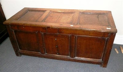 Lot 610 - An 18th century and later panelled oak coffer