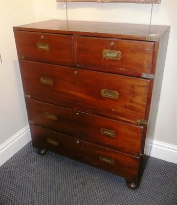 Lot 616 - A mahogany four height campaign chest