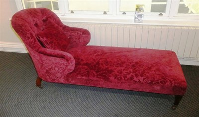 Lot 619 - 19th century red upholstered day bed