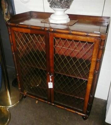 Lot 650 - A Regency style mahogany bookcase