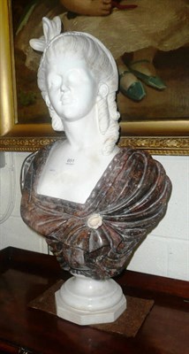 Lot 651 - An Italian two-type carved marble pedestal bust of a lady said to be Marie Antoinette, 20th century