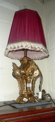 Lot 657 - Brass table lamp with face mask decoration