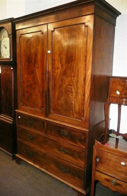 Lot 662 - A Georgian mahogany linen press