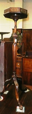 Lot 694 - A reproduction mahogany tripod urn stand