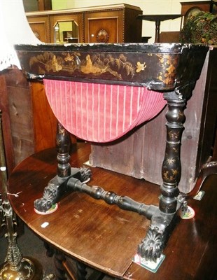 Lot 695 - A 19th century lacquered sewing table