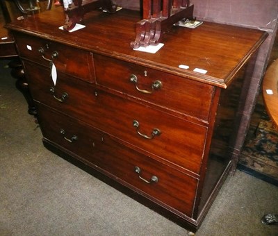 Lot 704 - Late 19th century mahogany three height chest of drawers