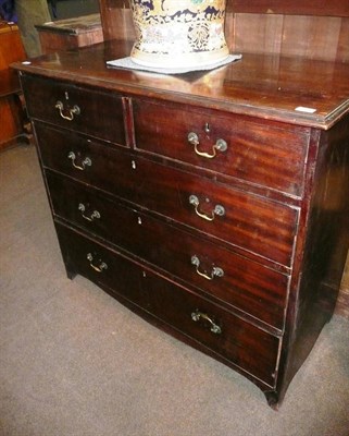 Lot 709 - A Georgian mahogany four height chest of drawers