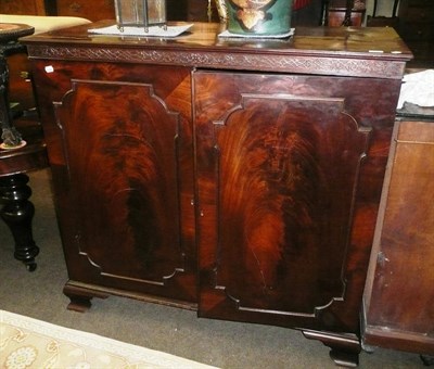 Lot 711 - A George III century mahogany two door linen cupboard