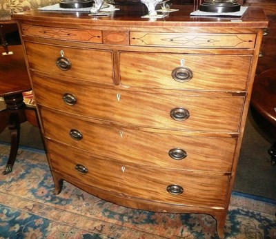 Lot 719 - A Georgian mahogany inlaid four height chest of drawers