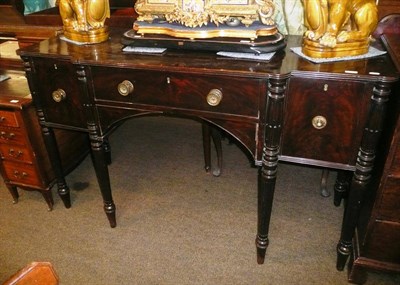 Lot 726 - A Georgian style mahogany brake front sideboard