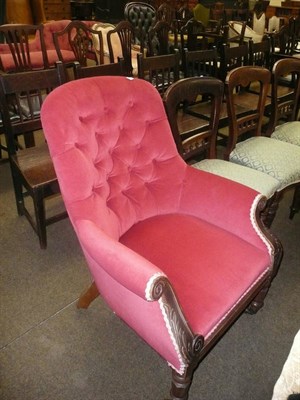 Lot 746 - Victorian red velvet upholstered button back armchair